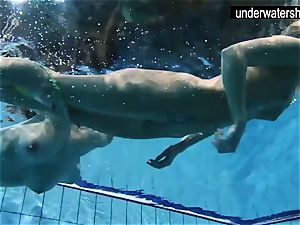 two killer amateurs showcasing their bods off under water
